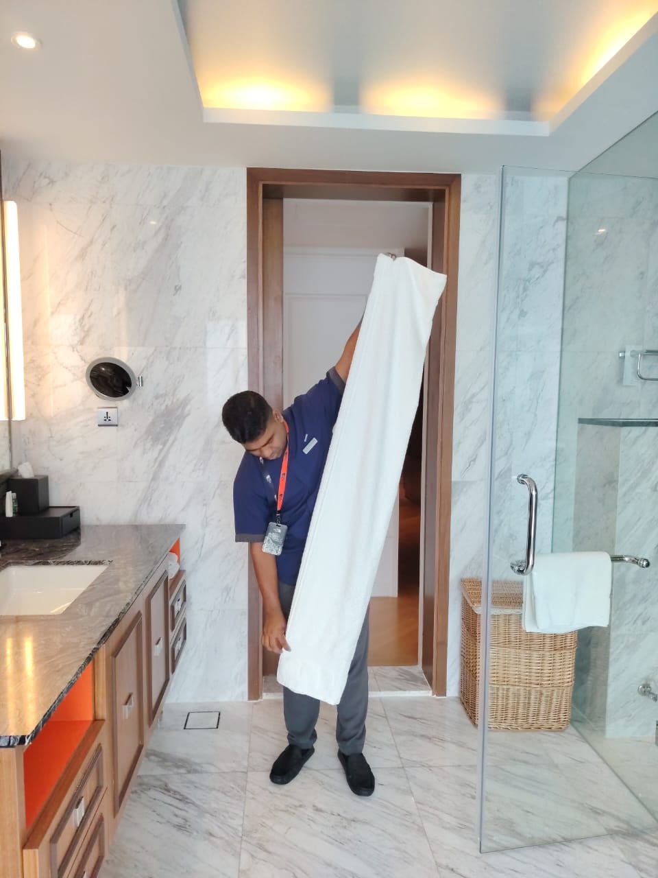 T&M housekeeping crew cleaning hotel public areas